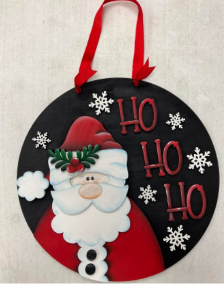 wooden santa sign that says "ho ho ho"