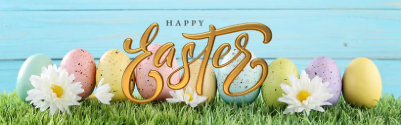 "Happy Easter" pastel colored Easter eggs on grass