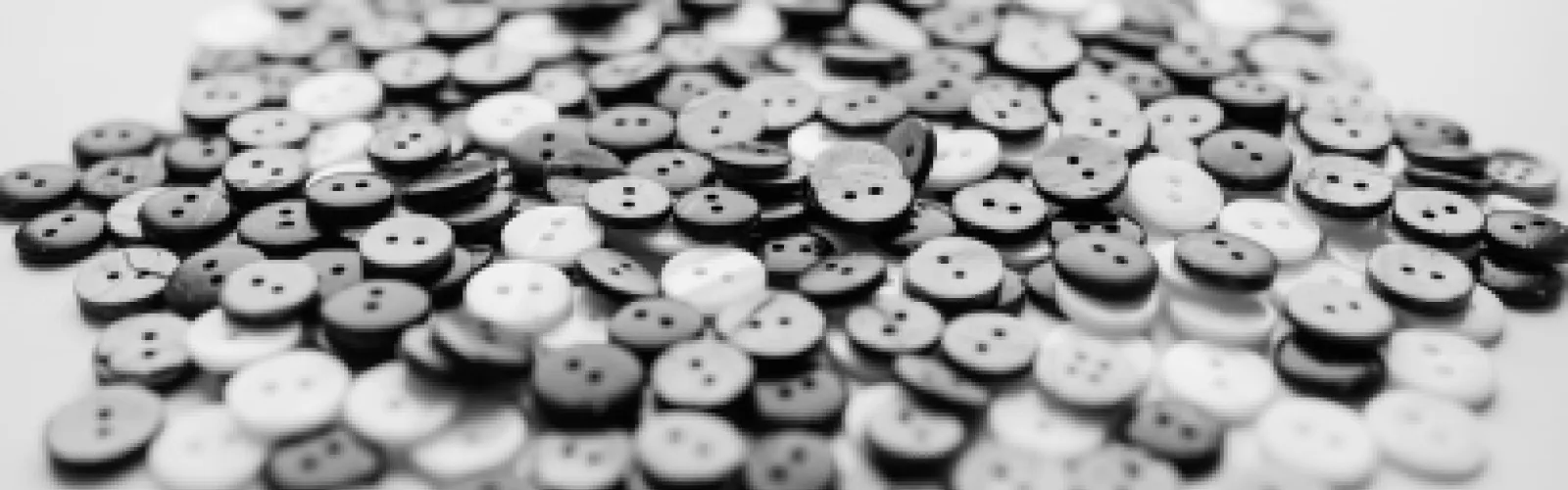 white and black buttons